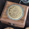 Top of Coast Guard Medallion Military Compass  box shown with engraving around solid brass medallion