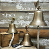 7 inch, 8 inch and 10 inch antiqued brass wall bells shown together for size references