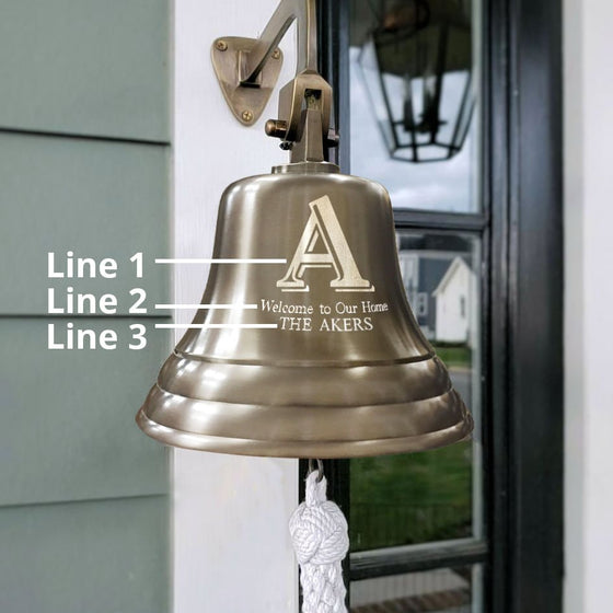 Graphics showing where customers can personalize 3 lines of text on Family Initial 8 inch diameter wall bell