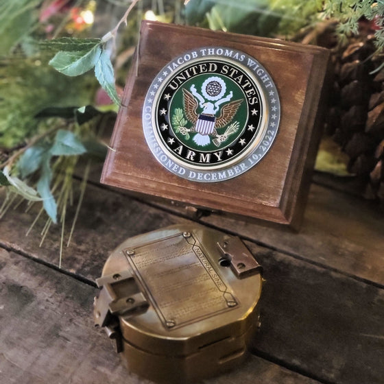Antiqued brass working vintage military compass replica with wood display box featuring a hand enameled Army logo medallion and engraved text