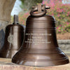 Two 18 inch antiqued brass finish hanging bells shown with examples of text and logo personalization