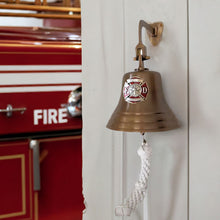  Antiqued patina solid brass wall bell with pewter red and silver firefighting medallion and fire truck in background