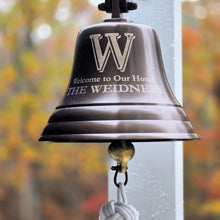  7 inch diameter antiqued brass wall bell with large engraved family initial