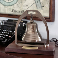  Antiqued brass bell with arch mounted on deluxe walnut base with company logos engraved on it