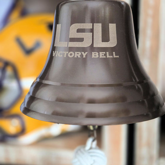 LSU Victory Bell with blurred background