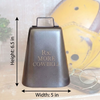 graphic of a large dark bronze cow bell showing height of 6.5 inches and width of 5