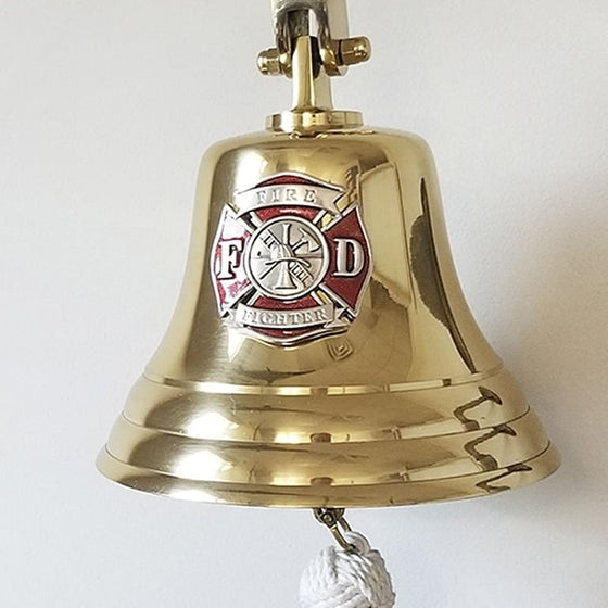 7 inch polished brass wall bell with red and silver Maltese Cross pewter medallion mounted on face of bell