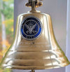 7 inch polished gold finish solid brass wall bell with silver and blue pewter Navy logo medallion and two lines of personalized engraving under medallion