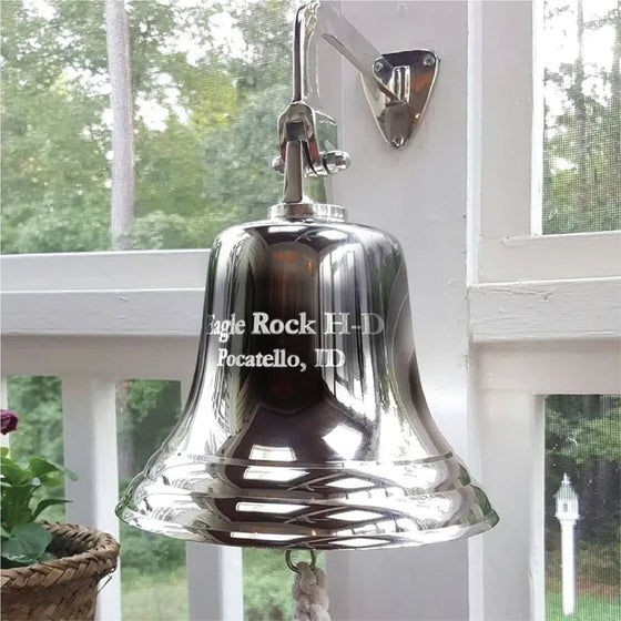 8 inch diameter highly polished nickel finish brass wall bell hanging on porch with two lines customer engraving