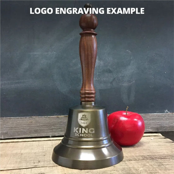 9 inch antiqued brass and wood  hand bell shown with optional logo engraving of a school