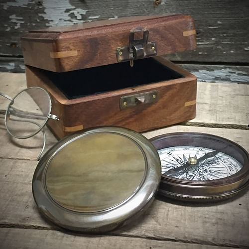 3 inch diameter brass compass with top screwed off and wood display box