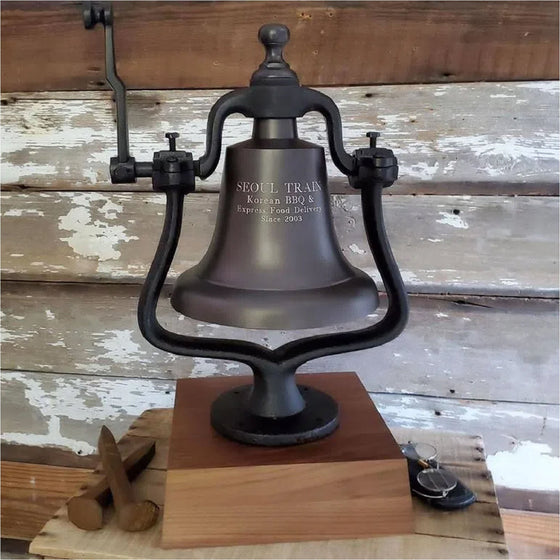 Large bronze finish brass and cast iron railroad bell on deluxe walnut wood base with four lines of personalized text engraving