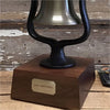 Optional personalized brass plate for deluxe wood railroad bell base