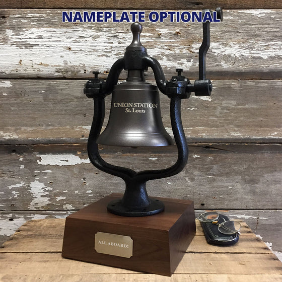 Medium dark bronze finish brass and cast iron railroad bell with optional engraving on a three inch tall walnut deluxe wood base and optional brass plate