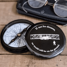  3 inch antiqued brass working compass with screw off lid featuring an engraved Wright Flyer with engraved inspirational aviation/flying quote